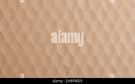 Diamond shape wrinkles on brown paper background close up view Stock Photo