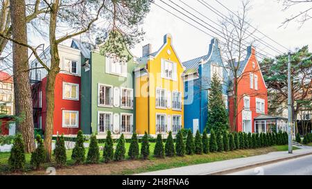 Blocked out of the four two-storey with attics multicolored building in Svetlogorsk, Russia Stock Photo