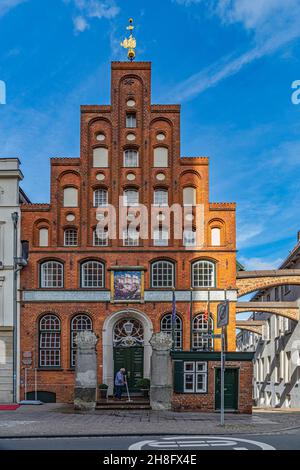 The facade of the historic building that housed the Schiffergesellschaft, a historic maritime association, currently houses a restaurant. Germany Stock Photo