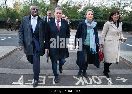 Labour leader, Keir Starmer (2nd from left) walks to today's shadow cabinet meeting with some of his new appointees including David Lammy (far left) Shadow Foreign secretary, Yvette Cooper (3rd from left) shadow Home Secretary and Rachel Reeves (far right) shadow Chancellor of the Exchequer after yesterday's reshuffle. Picture date: Tuesday November 30, 2021. Stock Photo