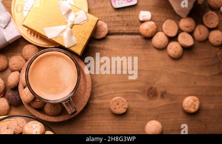 Dutch holiday Sinterklaas. kruidnoten cookies sweets, chocolate . Children party Saint Nicholas day five december. espresso coffee and sweets. space for text.  Stock Photo