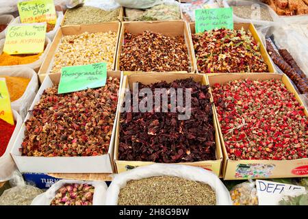Organic herbal tea at the market. Trading dried flower tea on Turkish bazaar. dried flower petals. Turkey, Turunc - September 13, 2021 Stock Photo