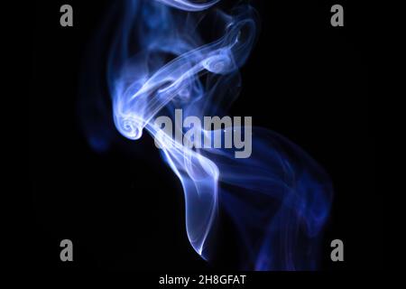 Abstract blue smoke on a black background photo Stock Photo