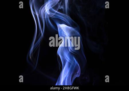 Abstract blue smoke on a black background Stock Photo