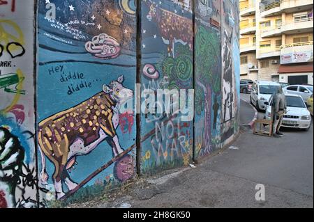 The graffiti on a Israeli separation wall in the West Bank. Stock Photo