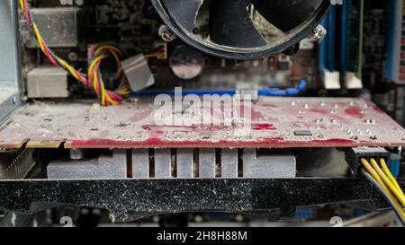 Close-up of a disassembled dusty computer, camera zooming in Stock Photo