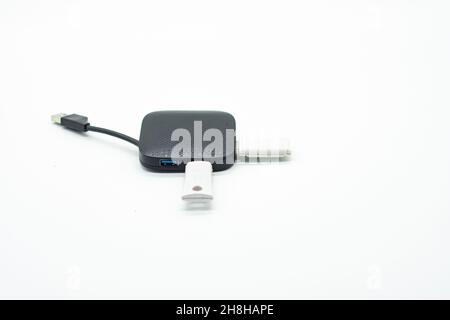 External USB hub and usb flash drives on white background Stock Photo
