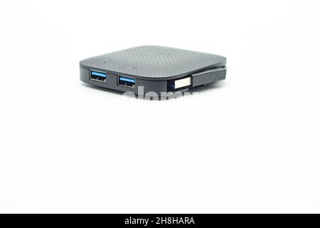 External USB hub and usb flash drives on white background Stock Photo
