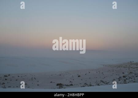 Minimalist landscape view of White Sands National Park, New Mexico at sunset. Stock Photo