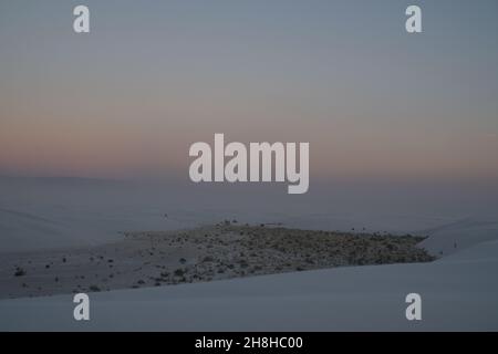 Minimalist landscape view of White Sands National Park, New Mexico at sunset. Stock Photo