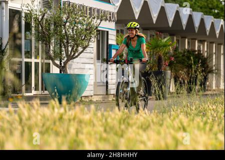 France, Drôme (26), Valence, ViaRhôna, Port de l'Epervière, cyclist riding on the ViaRhôna Stock Photo