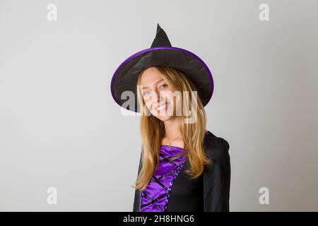 France, Paris, Halloween, young girl in witch costume Stock Photo