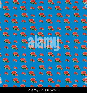 Vectorized pattern of halved and sliced watermelons on blue background. Stock Vector