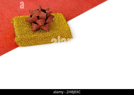 Golden sponge for dishwashing isolated on white background Stock Photo