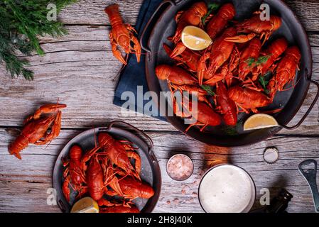 boiled crayfish with beer on a wooden background Stock Photo