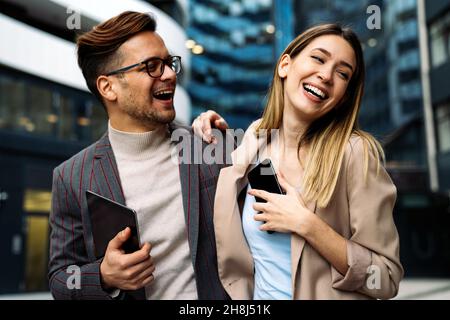 Two creative business people working on social media strategy using a digital tablet Stock Photo