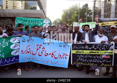 Hyderabad, Pakistan, November 30, 2021. Traders of Muhammadi Furniture Market Manzoor Colony are holding protest demonstration against sales tax, at Karachi press club on Tuesday, November 30, 2021. Stock Photo