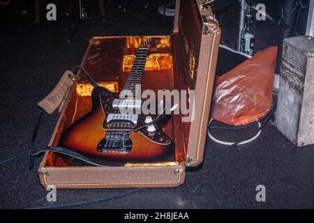 Color shot of a vintage guitar in a case Stock Photo