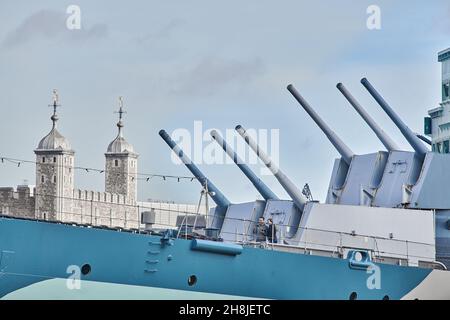 Big guns of HMS Belfast, a light crusier war ship, now a museum moored on the south bank of the river Thames, London, England. Stock Photo