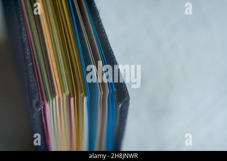 recycled color sheets inside a folder. Handmade book. copy space Stock Photo