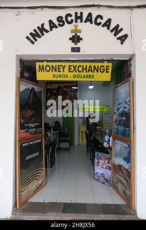 Money Exchange in Cusco Peru cash swop buy new old counter Euros Dollars sign signs Dolares shop building travel money  people swapping staff Stock Photo