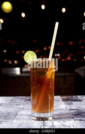 cocktail in a transparent glass with a starry black background, various Stock Photo
