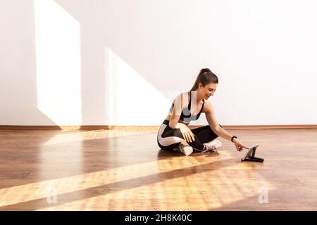 Girl in black tights on the white background Stock Photo - Alamy