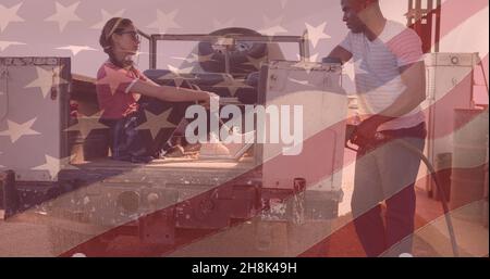 Double exposure of man refueling vehicle while looking at woman with american flag Stock Photo