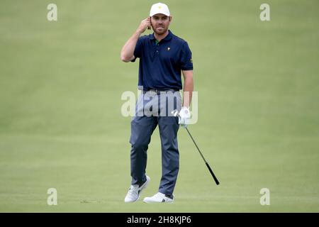 Louis Oosthuizen of South Africa hits his approach shot during round 3 of The Presidents Cup Credit: Speed Media/Alamy Live News Stock Photo