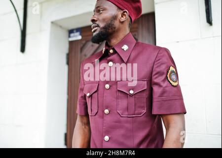 Portrait of African American military man in red uniform and beret. Stock Photo