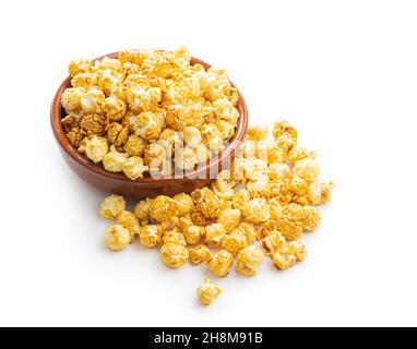 Sweet caramel popcorn in bowl isolated on white background. Stock Photo