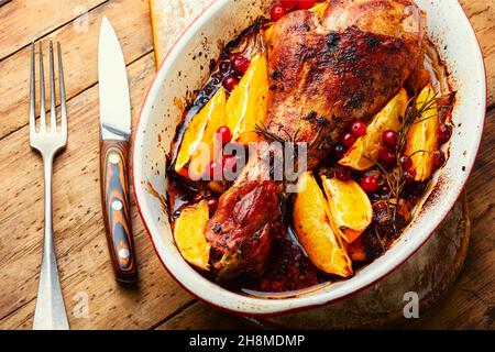 Appetizing turkey drumstick grilled with oranges and spices Stock Photo