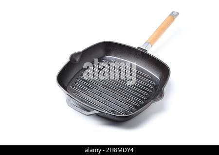 Pan grill isolated on white background, close up. Pan grill isolated on white background, close up of a grill pan Stock Photo