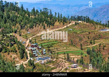 Sarahan hill station aerial view with city houses on the mountain slopes with scenic Himalaya landscape at Himachal Pradesh, India Stock Photo