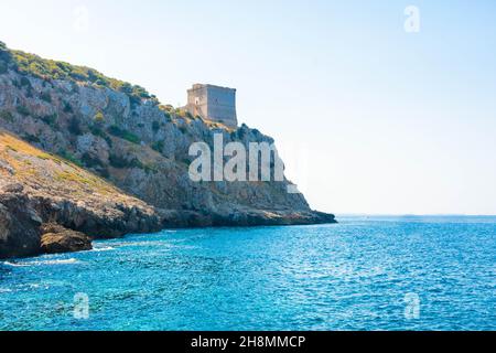 Ancient tower on a cliff of Porto Selvaggio, Salento, Apulia, Italy Stock Photo