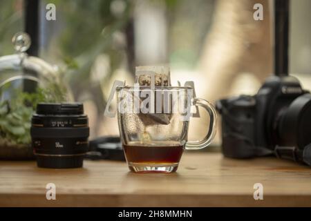 BOGOTA, COLOMBIA - Mar 06, 2019: The preparation of coffee in a drip bag Stock Photo