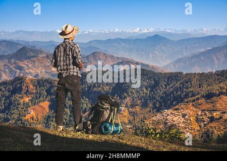 Tourist hiker at Sarahan Himachal Pradesh India with scenic mountain landscape Stock Photo