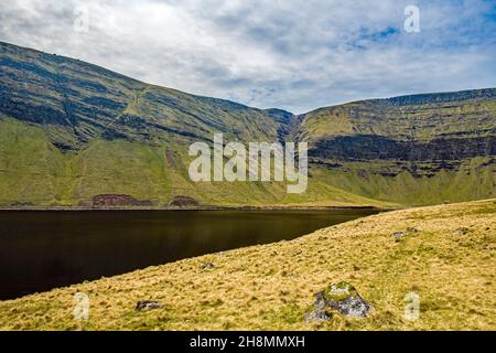 Llyn y Fan Fach in the Black Mountain in Carmarthenshire, part of the Brecon Beacons National Park. Stock Photo