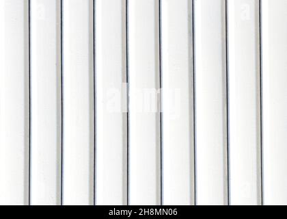 White gray wood color texture vertical for background. Surface light clean of table top view. Natural patterns for design art work and interior or Stock Photo