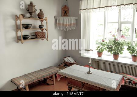 Old interior of the kitchen room in the russian house Stock Photo