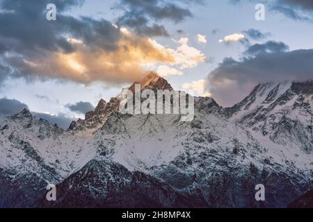 Kailash Himalaya mountain range snow peaks at sunset as viewed from Kaza at Himachal Pradesh, India Stock Photo