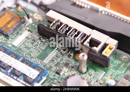 Close up of PCB USB and network sockets on computer motherboard Stock Photo
