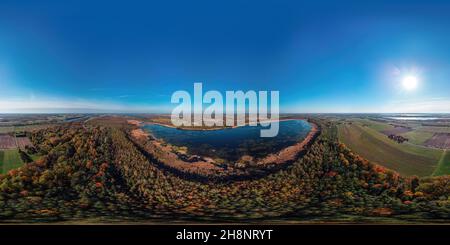 360 degree panoramic view of Beautiful sunny day over autumn forests and lakes in Estonia