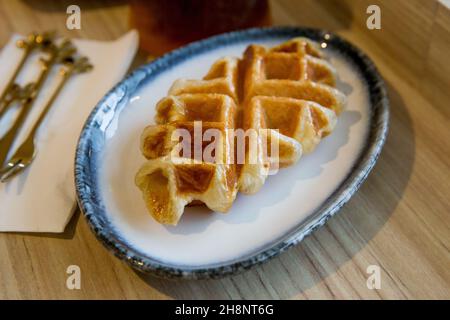 Top view of Plain Waffle on wooden surface Stock Photo