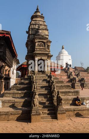 Stone guardians on the Siddhi Laxmi Hindu temple in Durbar Square. Medieval Newar city of Bhaktapur, Nepal. Stock Photo