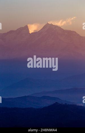 Sunrise on the peaks of Manaslu (left) and Ngadi Chuli/Peak 29 in the Mansiri Himal.  Seen from Bandipur, Nepal. Stock Photo