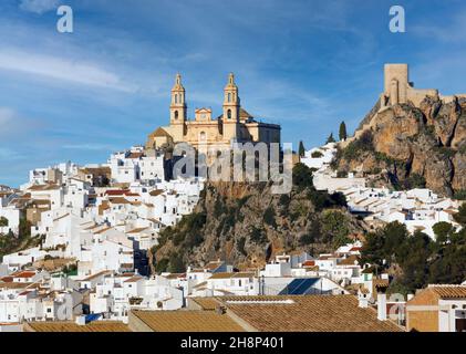 Olvera, Cadiz Province, Andalusia, southern Spain.  Overall view of town with Parroquia de Nuestra Señora de la Encarnación (the Parish of Our Lady of Stock Photo