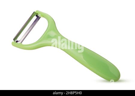 Green vegetable peelers close up isolated on white background. Clipping Path. Full depth of field. Stock Photo