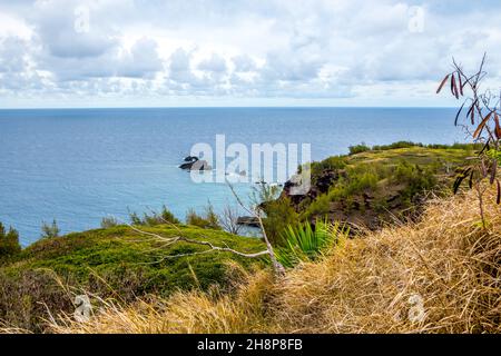 A large refreshing flow of water with a peaceful view of the Honolua Bay Stock Photo