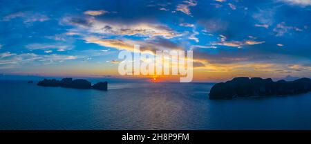 Amazing sunset aerial view of Nui Beach from drone. Ko Phi Phi Don, Thailand. Andaman Sea Stock Photo